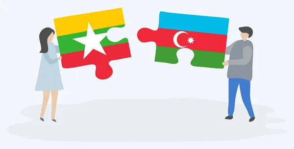 Couple Holding Two Puzzles Pieces Burmese Azerbaijani Flags Myanmar Azerbaijan — Stock Vector