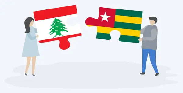 Para Trzyma Dwa Kawałki Puzzli Libańskich Togolese Flagi Symbole Narodowe — Wektor stockowy