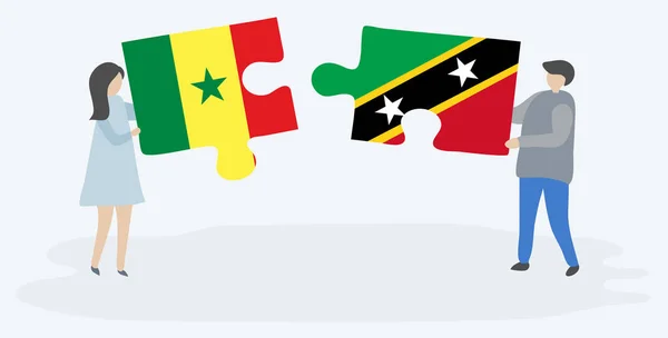 Paar Houden Twee Puzzels Stukken Met Senegalese Kittitian Vlaggen Senegal — Stockvector