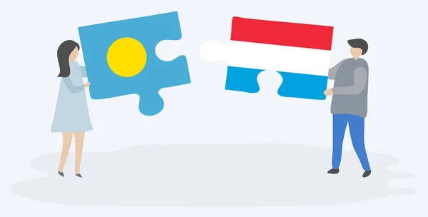 Casal Segurando Duas Peças Quebra Cabeças Com Bandeiras Palauanas Luxemburguesas — Vetor de Stock