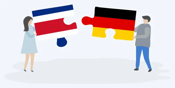 一对夫妇拿着两块拼图 上面挂着哥斯达黎加和德国国旗 哥斯达黎加和德国的国家符号在一起 — 图库矢量图片