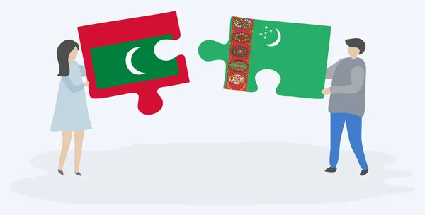 モルディブとトルクメンの旗を持つ2つのパズルピースを持つカップル モルディブとトルクメニスタンの国のシンボル — ストックベクタ