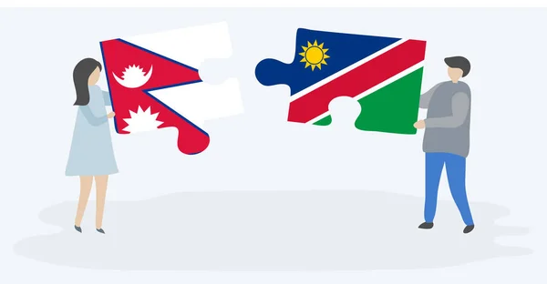 Pareja Sosteniendo Dos Piezas Rompecabezas Con Banderas Nepal Namibia Nepal — Vector de stock