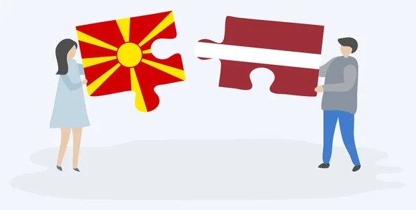 Casal Segurando Duas Peças Quebra Cabeças Com Bandeiras Macedônia Letônia —  Vetores de Stock
