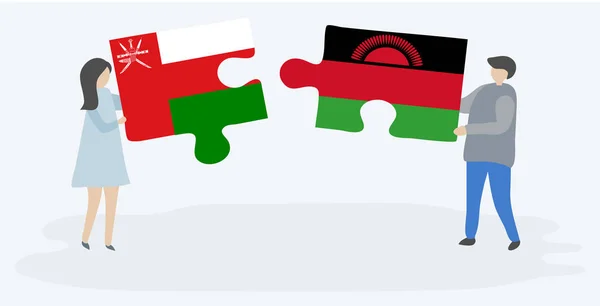 Dvojice Drží Dvě Skládanky Vlajkami Omani Malawian Národní Symboly Ománu — Stockový vektor