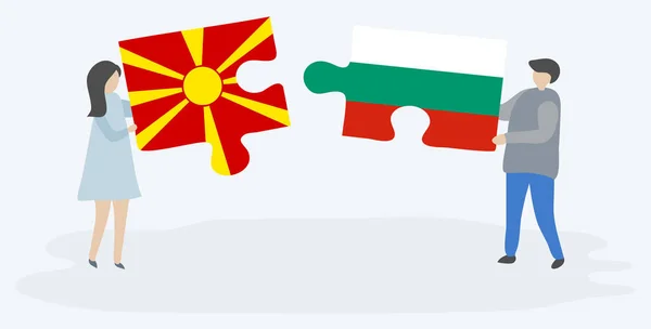 Casal Segurando Duas Peças Quebra Cabeças Com Bandeiras Macedônia Búlgara —  Vetores de Stock