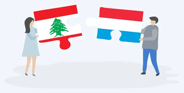Pareja Sosteniendo Dos Piezas Rompecabezas Con Banderas Libanesas Luxemburguesas Líbano — Archivo Imágenes Vectoriales