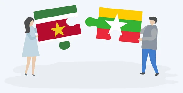 Ζευγάρι Που Κατέχει Δύο Κομμάτια Παζλ Σουρινάμ Και Βιρμανικές Σημαίες — Διανυσματικό Αρχείο