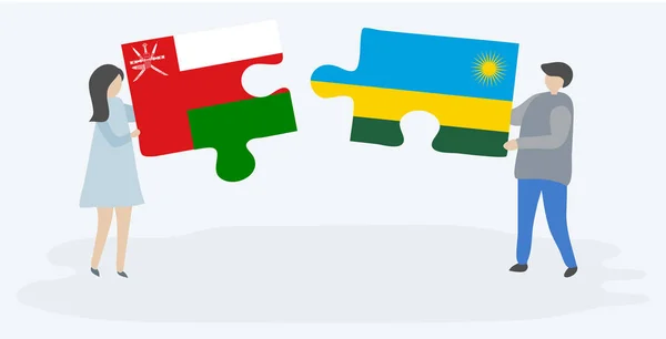 Couple Holding Two Puzzles Pieces Omani Rwandan Flags Oman Rwanda — Stock Vector