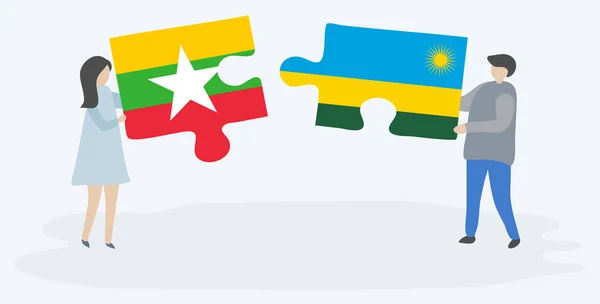 Ζευγάρι Που Κρατά Δύο Κομμάτια Παζλ Σημαίες Βιρμανίας Και Ρουάντα — Διανυσματικό Αρχείο