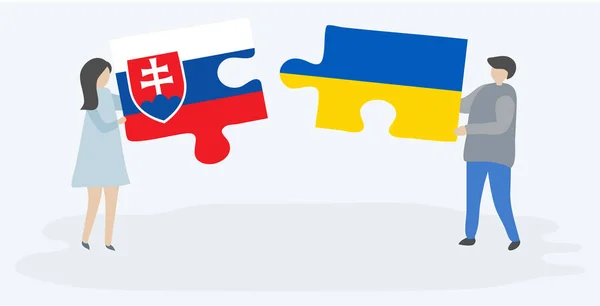 Para Trzymania Dwóch Puzzli Flag Słowackich Ukraińskich Słowackie Ukraińskie Symbole — Wektor stockowy