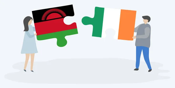 Dvojice Drží Dvě Skládanky Malawianskou Irskou Vlajkou Vnitrostátní Symboly Malawi — Stockový vektor