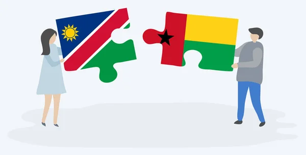 Pareja Sosteniendo Dos Piezas Rompecabezas Con Banderas Namibia Bissau Guinea — Vector de stock