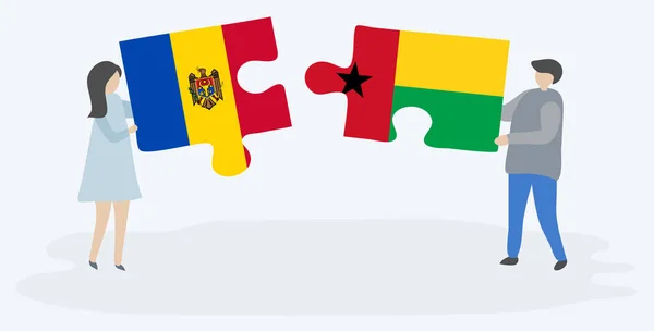 Moldova Bissau Gine Bayrakları Ile Iki Bulmaca Parçaları Tutan Çift — Stok Vektör