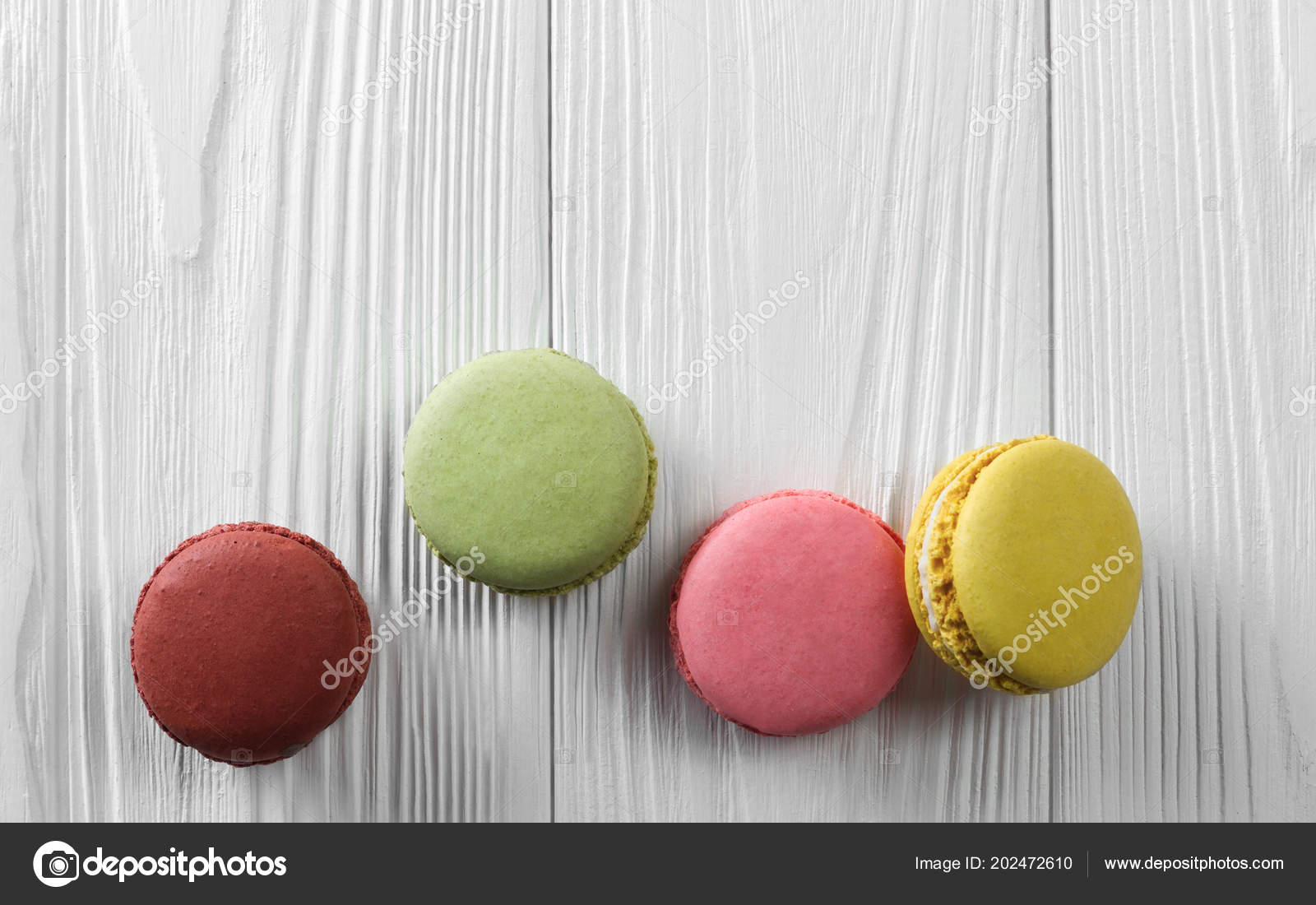 Colorful Macarons On Wooden Table Stock Photo C Ayman Alakhras
