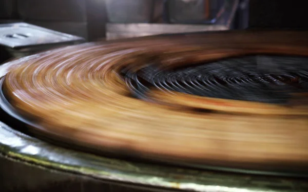 Ribs spinning on round grill - Large Spinning grill for meat in restaurant
