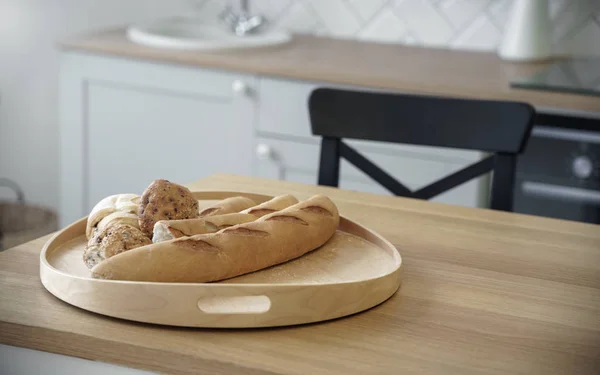 French baguette Bread in wooden tray on kitchen table