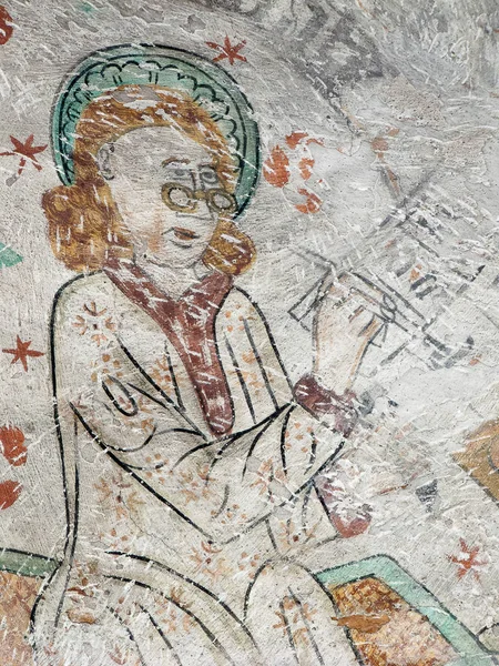 Fresca Sfântului Matei cu ochelari de protecție, compunând cartea sa evanghelică — Fotografie, imagine de stoc