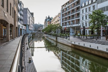 Downtown Aarhus with the sidewalk and canal