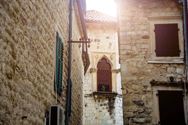 Street windows in old stone houses Kotor, Montenegro