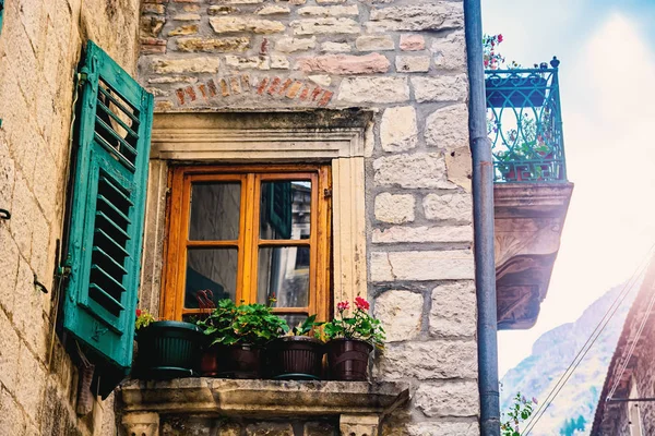 Street windows in old stone houses Kotor, Montenegro