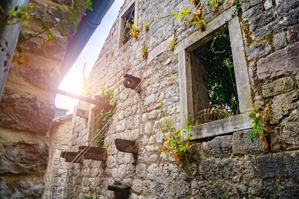 Street windows in old stone houses Kotor, Montenegro