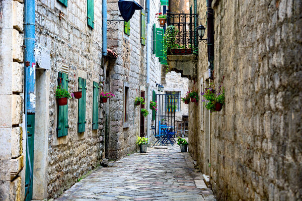 Old stone town in Kotor. Narrow streets among houses