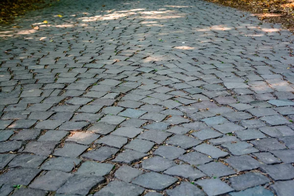 Textuur van een stenen weg — Stockfoto