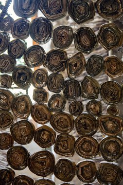 Saman dokusu bir spiral içine yuvarlanır