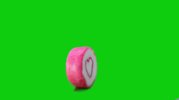 Cuore Caramelle Rosse Sfondo Verde Loop Rotate — Video Stock