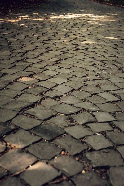 Textuur van een stenen weg — Stockfoto