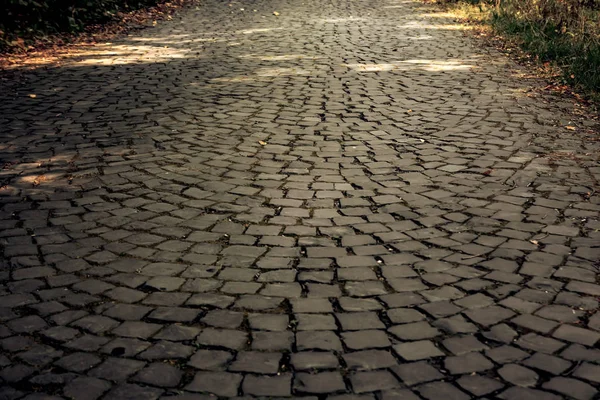 Textuur van een stenen weg — Stockfoto