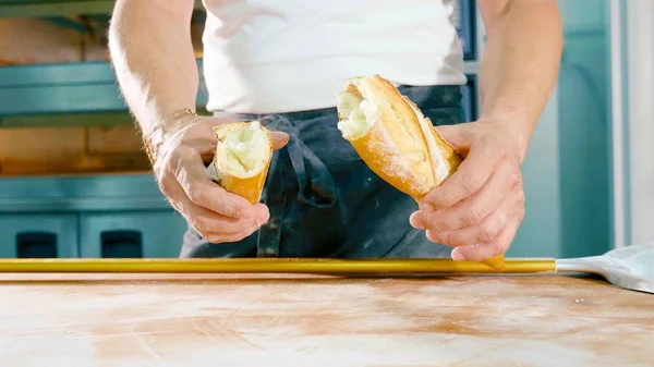 Baker Tearing Fresh Bread Half Male Hands Breaks Baguette Inspecting — Stock Photo, Image