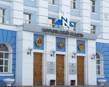 Norilsk, Russia - October, 10, 2015: Norilsk Nickel central office in the city of Norilsk. clipart