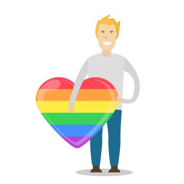 Bir gökkuşağı kalp tutan delikanlı. LGBT topluluğu. Eşcinsel aşk