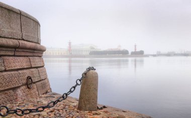 Misty dawn over the Spit of Vasilievsky island in St. Petersburg clipart