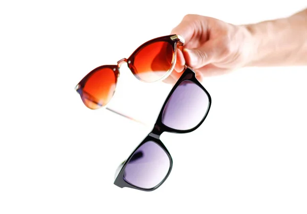 Kézi Üzem Két Napszemüveg Férfi Női Napszemüveg Közelről Elszigetelt Fehér — Stock Fotó
