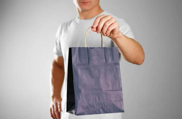 Man Holding Blue Gift Bag Close Isolated Background — Stock Photo, Image