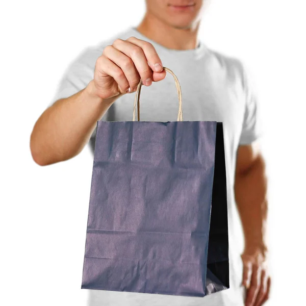 Man Holding Blue Gift Bag Close Isolated White Background — Stock Photo, Image