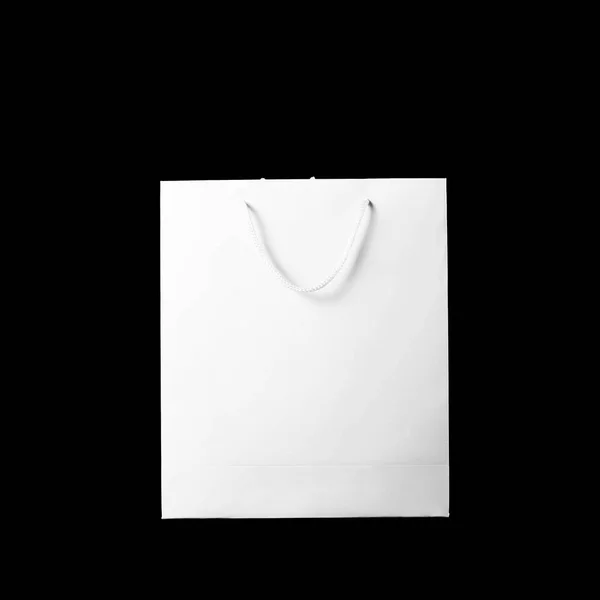 Schöne Weiße Geschenktüte Nahaufnahme Isoliert Auf Schwarzem Hintergrund — Stockfoto