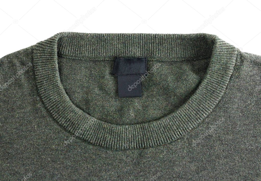 Label men's sweatshirts. Shirt collar. Close up. Isolated on black background.