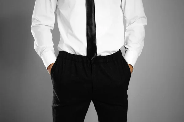 Businessman White Shirt Tie Holding Hands His Pockets Isolated Background — Stock Photo, Image