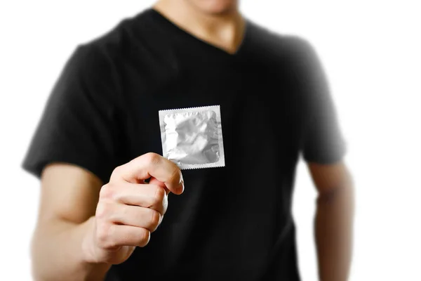 Man Hand Holding Single Condom Close Isolated Grey Background — Stock Photo, Image