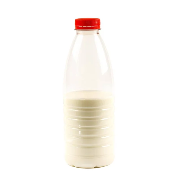 우유의 절반 병입니다. 닫습니다. 흰색 배경에 고립 — 스톡 사진