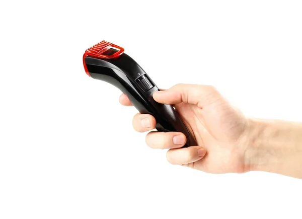 Hand holding black beard hair trimmer. Close up. Isolated on whi — Stock Photo, Image