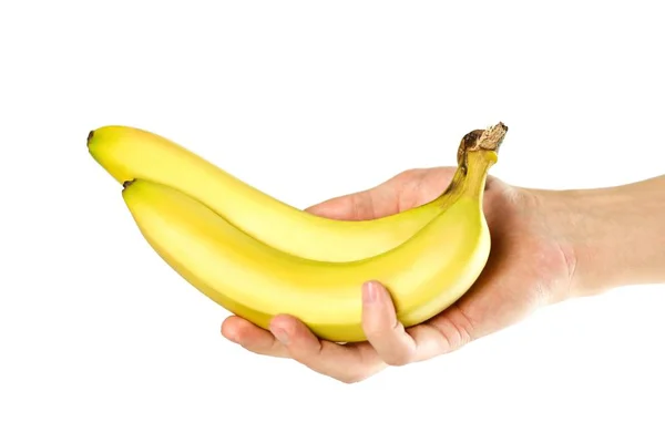 バナナを2つ持つ手。クローズアップ。白い背景に隔離 — ストック写真