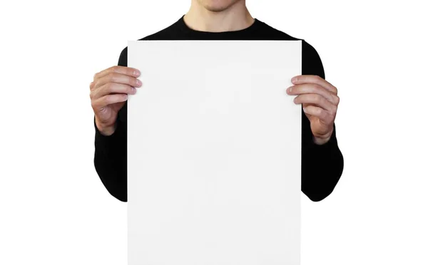 Een man met een wit vel papier. Het houden van een boekje. Sluit u — Stockfoto