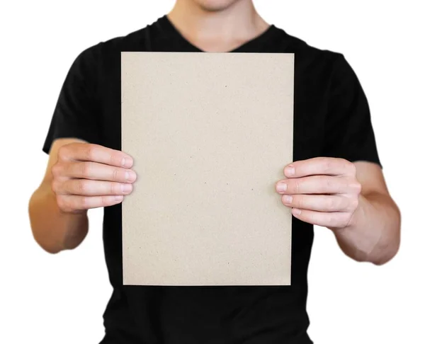 Ένας άντρας που κρατά ένα λευκό φύλλο χαρτί. Κρατώντας ένα φυλλάδιο. Κοντινό u — Φωτογραφία Αρχείου