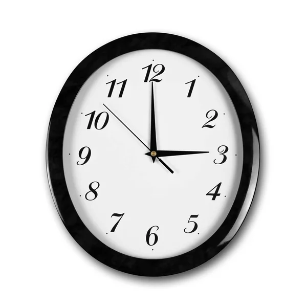 黒いフレームが付いている大きい円形の白い壁の時計。ハンドポイント t — ストック写真