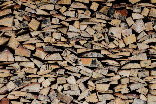 De textuur van gestapeld hout. Brandhout gestapeld in een hout stapel. Clo — Gratis stockfoto